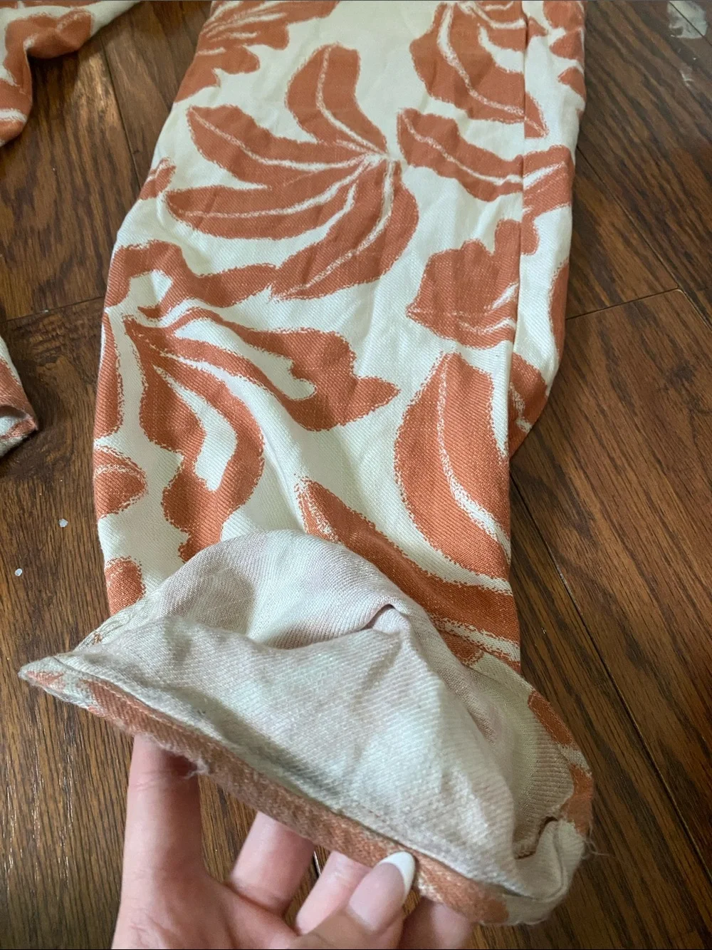 Sienna Sky Cream and Orange Floral Wide-Leg Pants
